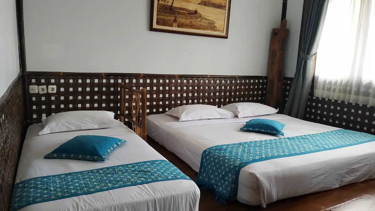 Kamar dengan dua tempat tidur di Kampung Sumber Alam